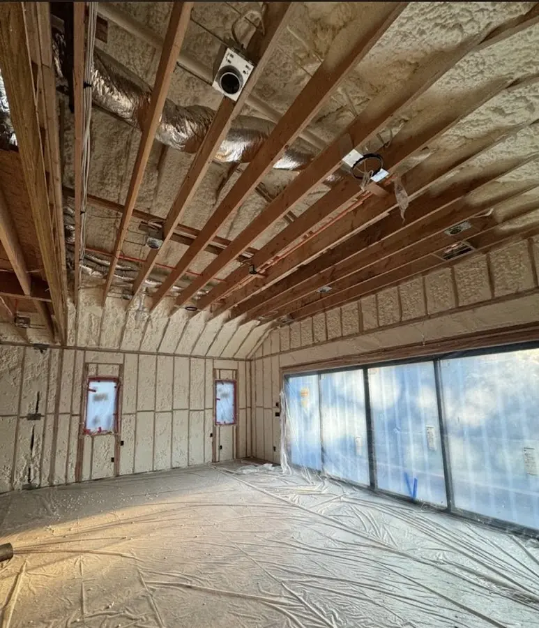 Interior walls and ceiling insulated with spray foam during new construction in Running Springs